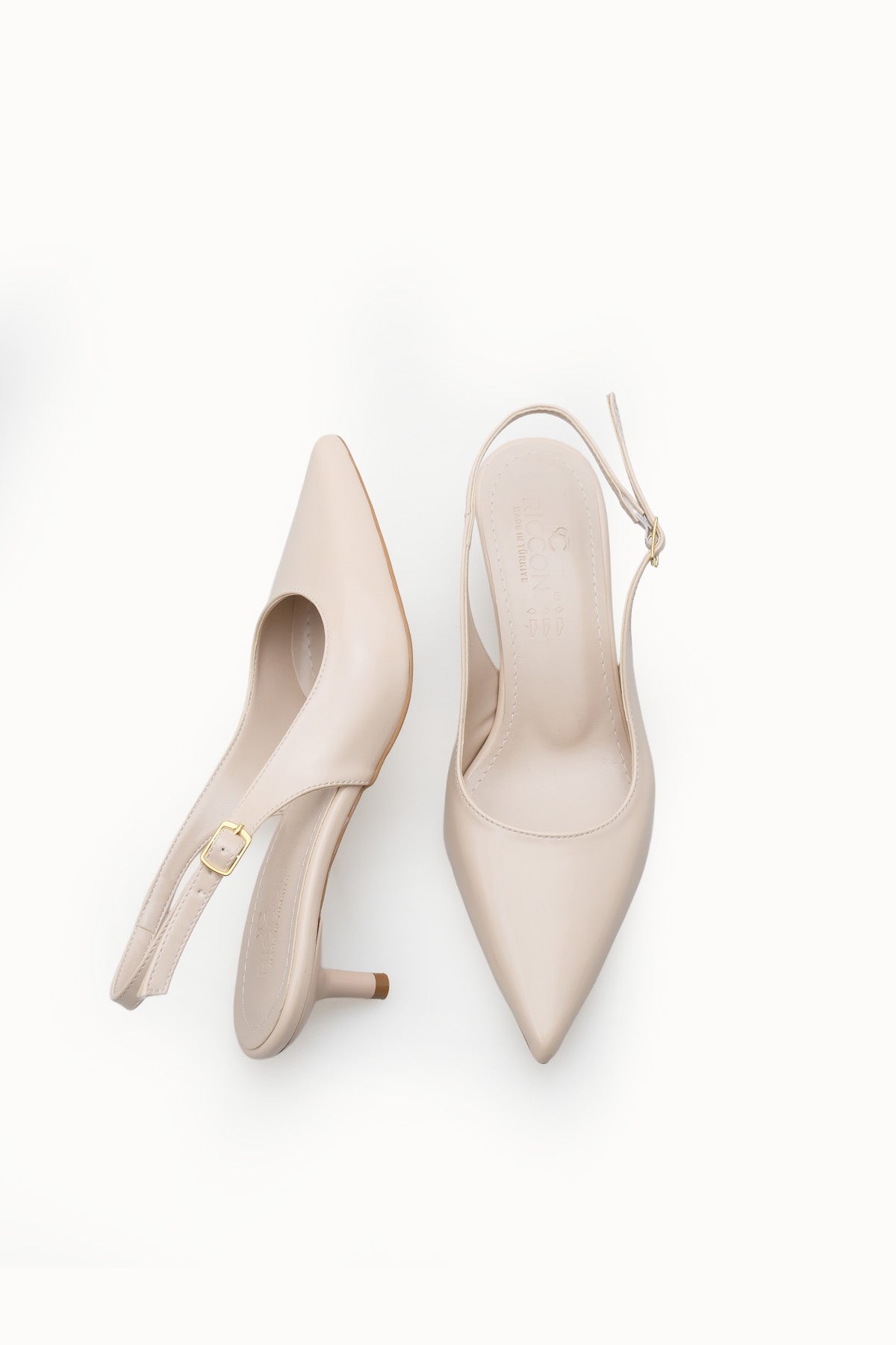 Riccon Kadın Sivri Burunlu Arkası Açık İnce Topuklu Ayakkabı 0012200 Ten Rugan