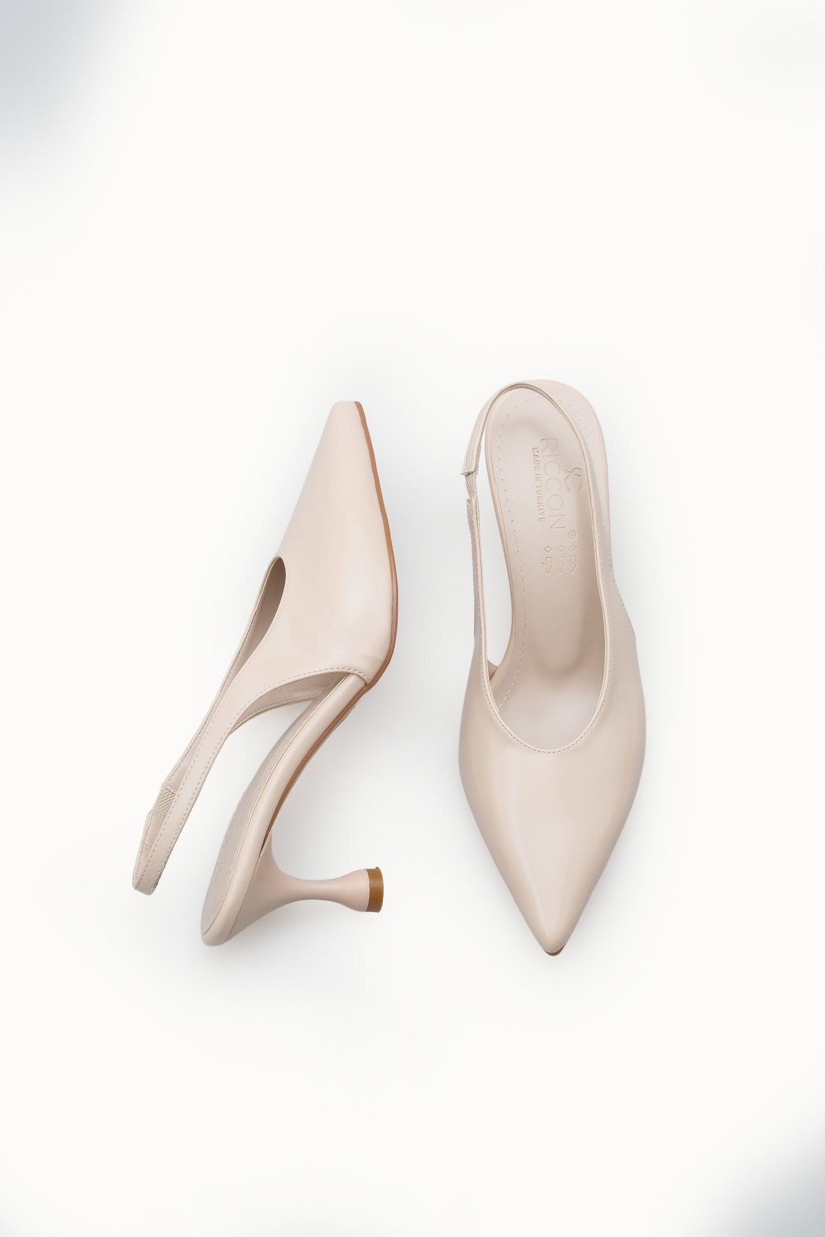 Riccon Kadın Sivri Burunlu Arkası Açık İnce Topuklu Ayakkabı 0012560 Ten Rugan