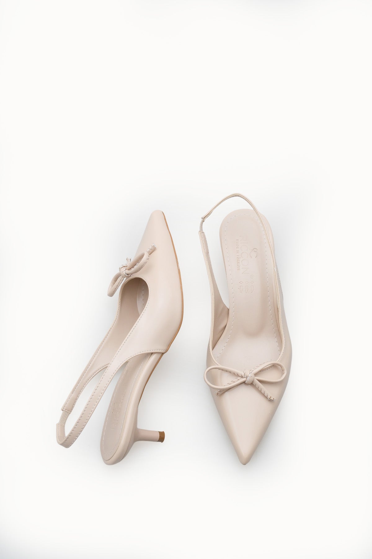 Riccon Kadın Sivri Burunlu Arkası Açık İnce Topuklu Ayakkabı 0012201 Ten Rugan