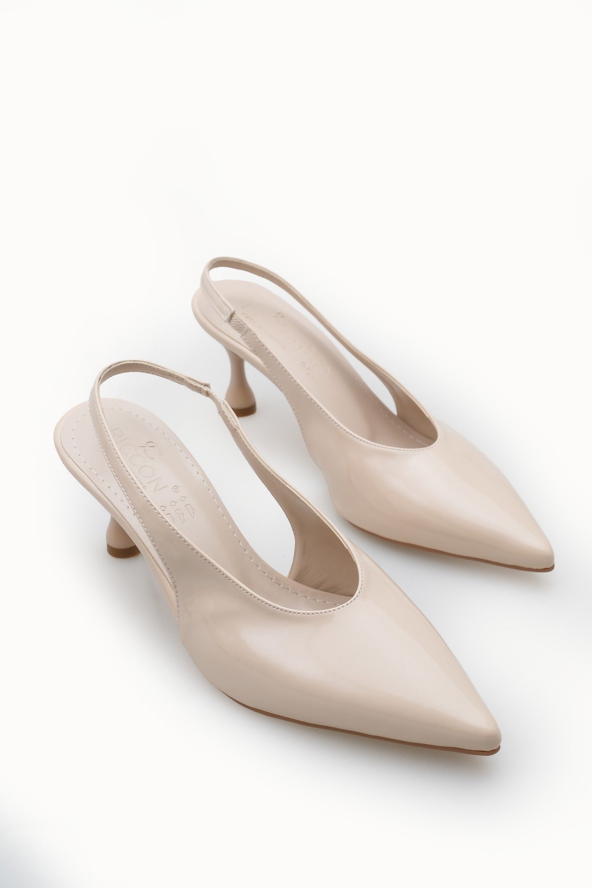 Riccon Kadın Sivri Burunlu Arkası Açık İnce Topuklu Ayakkabı 0012560 Ten Rugan